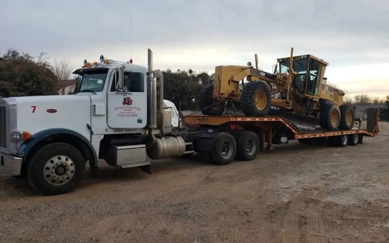 Manny's Dump Truck Service — Trucking company