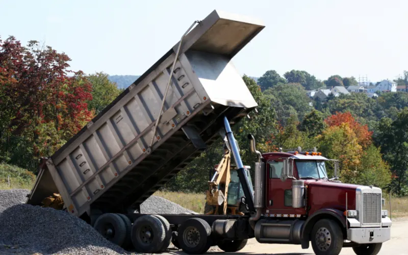 Cowboy Trucking LLC - Gravel Hauling & Belly Dumps Trucking | Bulk Feed Hauling — Trucking company