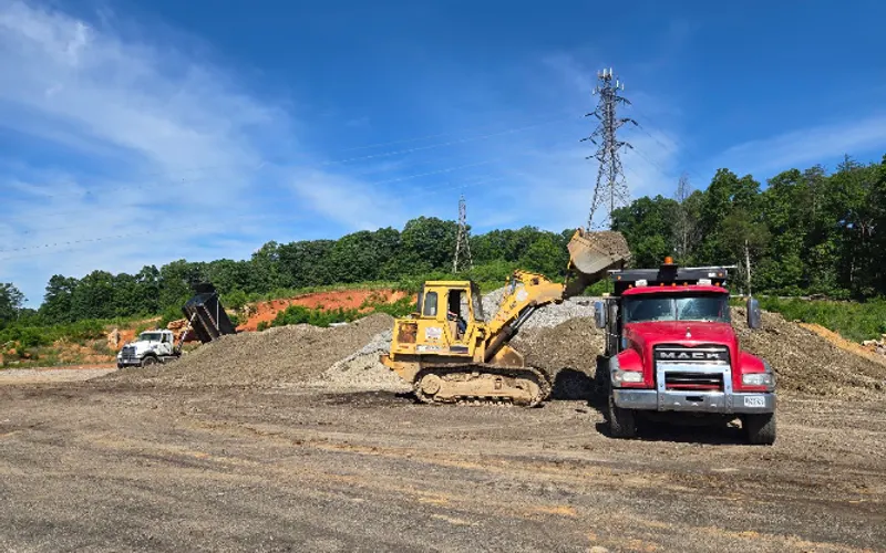 KINGS HAULING AND EXCAVATING INC. — Excavating contractor