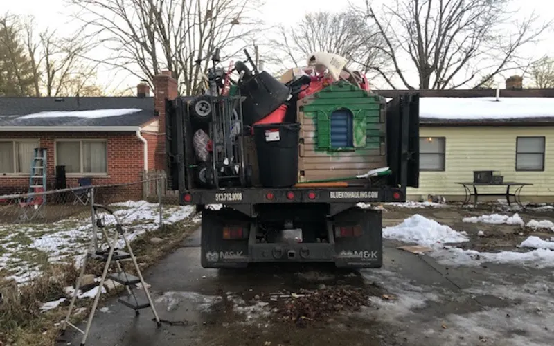 Blue Koi Hauling and Junk Removal — Waste management service